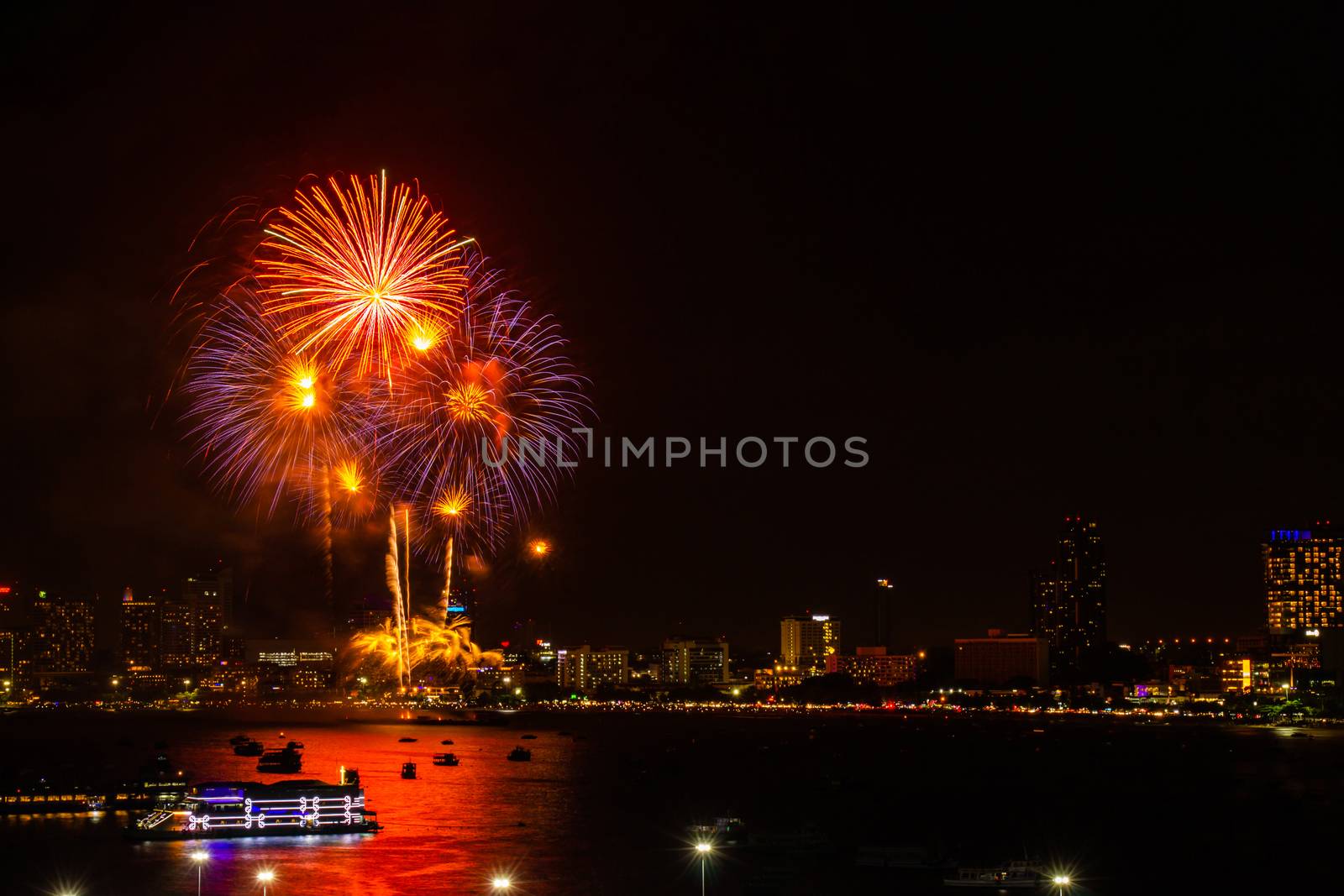 Firework colorful on night city view background for celebration festival.