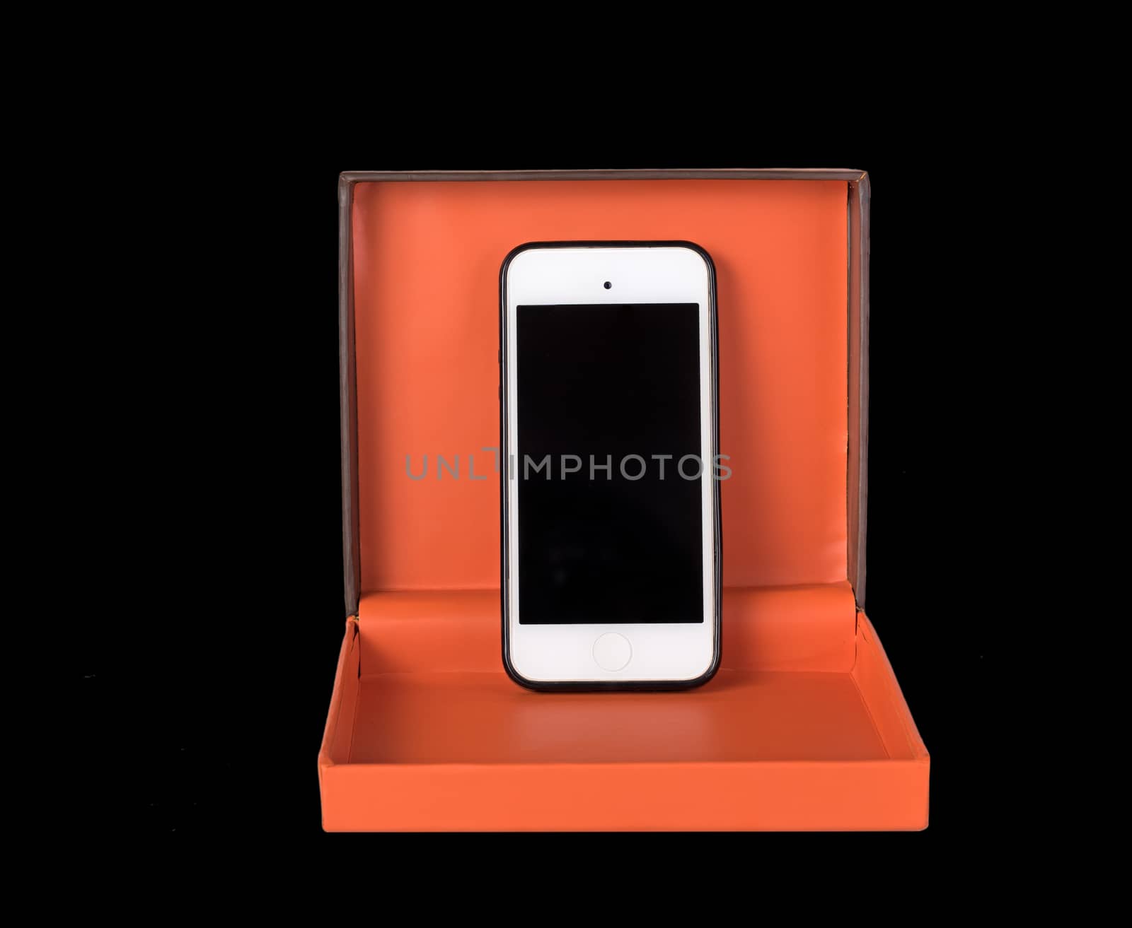 Orange gift box and smartphone isolated on white background