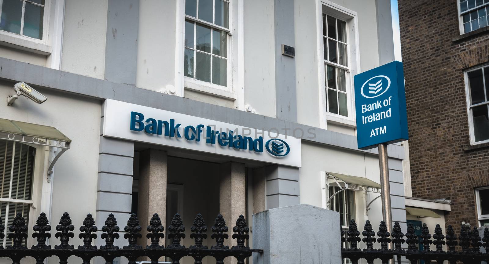 Dublin, Ireland - February 13, 2019: View of the front of a branch of the Bank of Ireland in the historic city center on a winter day