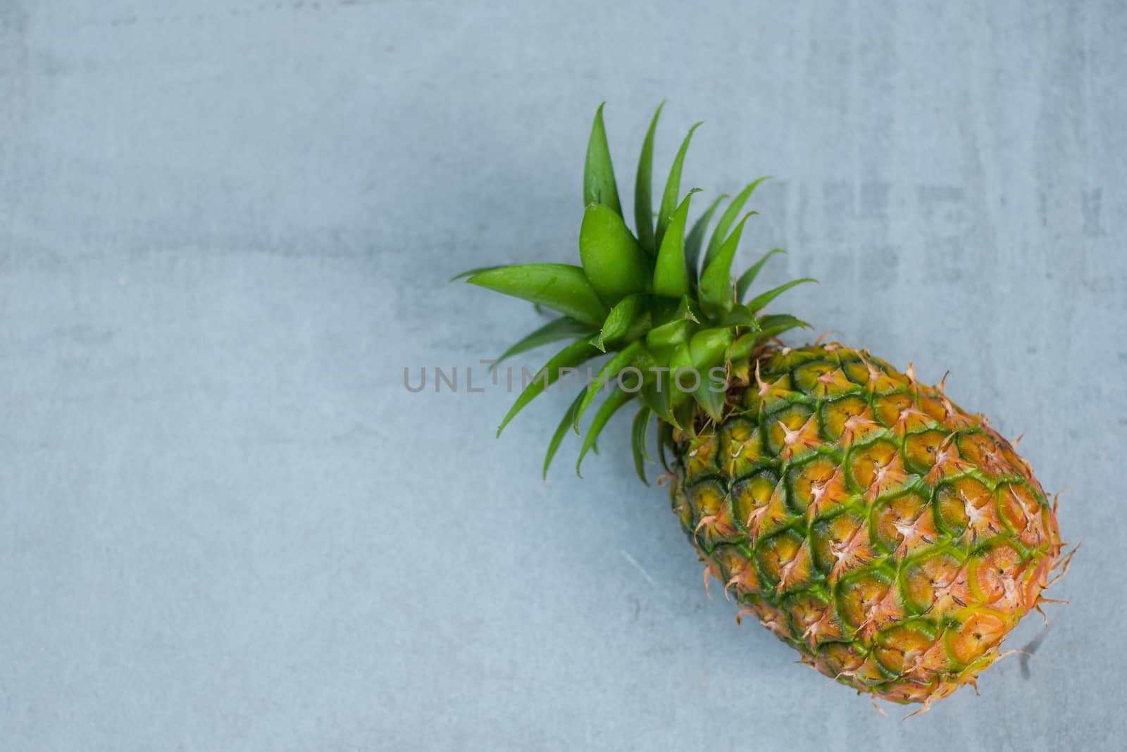 pineapple fruit on wood table, picec of pineapple fruit for diet by kaiskynet