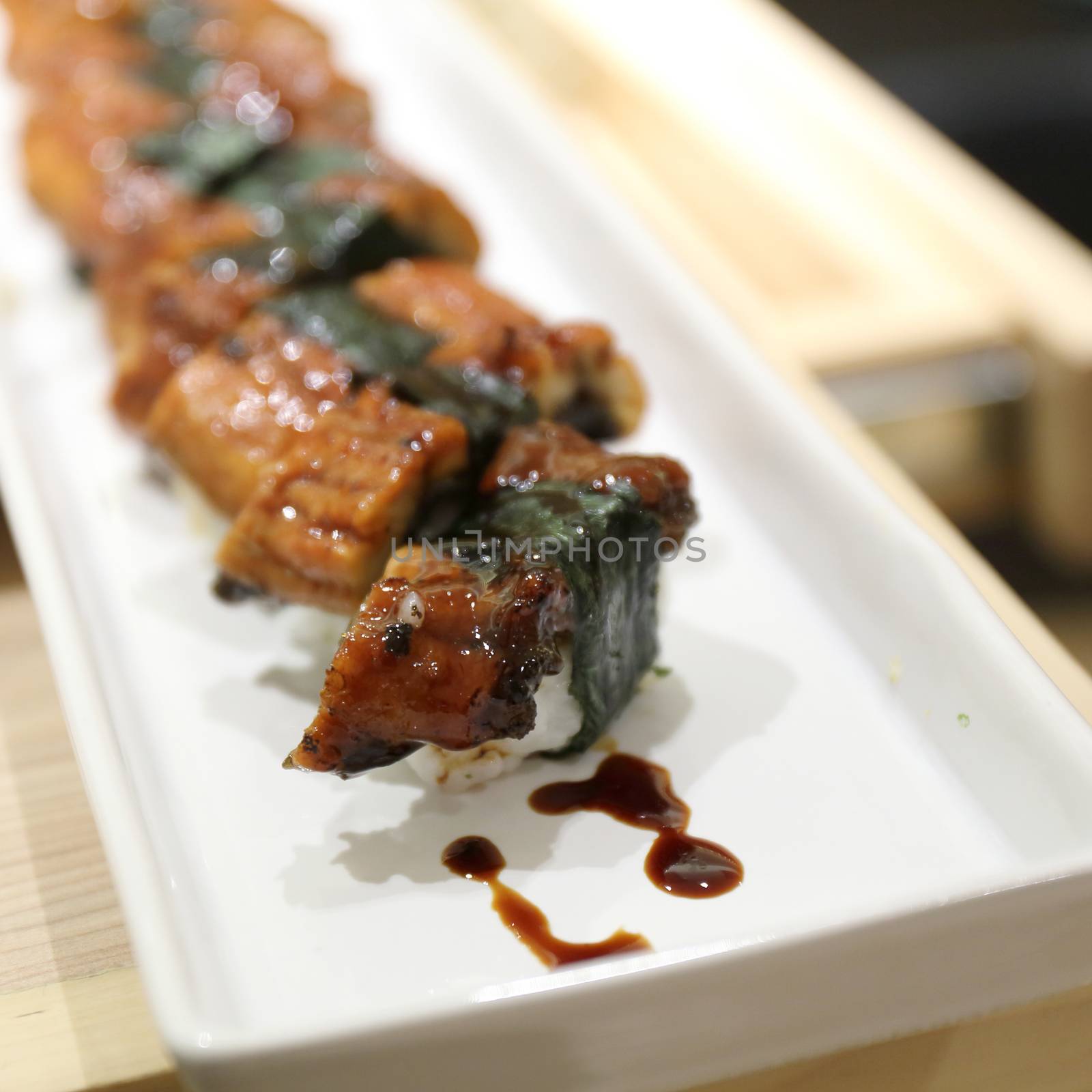 japanese food rice with eel ( unagi ) eel sushi  by piyato