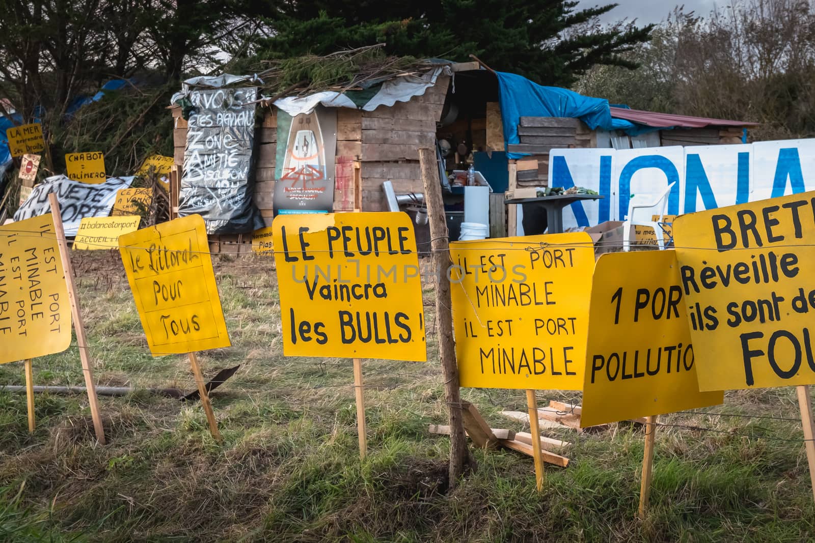 set of yellow sign on a protest area in an area to defend ZAD in by AtlanticEUROSTOXX