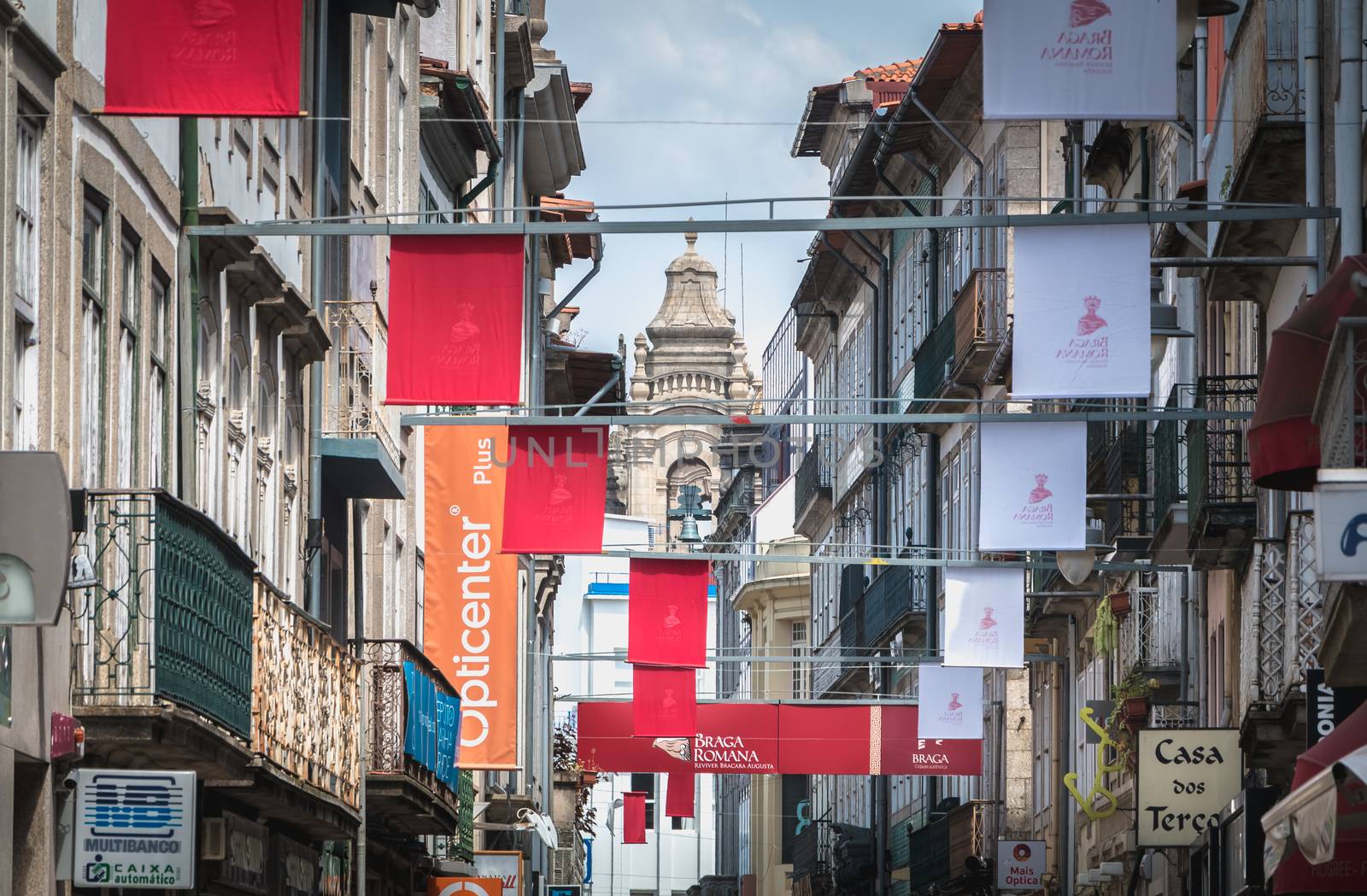 Braga, Portugal - May 23, 2018: View of a street in the historic city center decorated for the city festival Braga Romana on a spring day