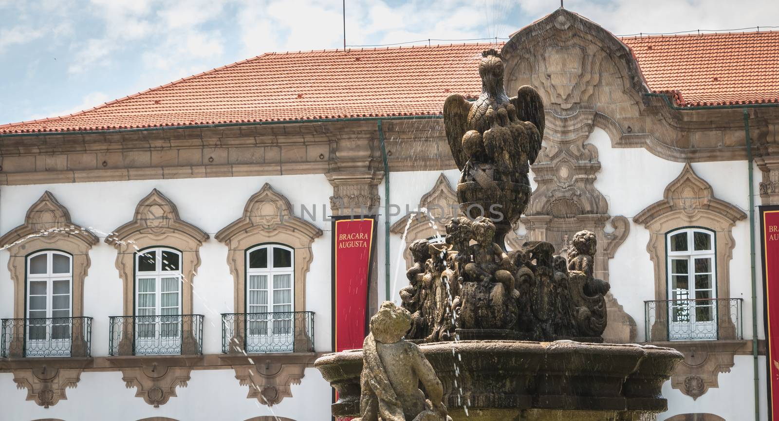 Braga, Portugal - May 23, 2018: View of Braga Town Hall decorated for Braga Romana City Day on a spring day