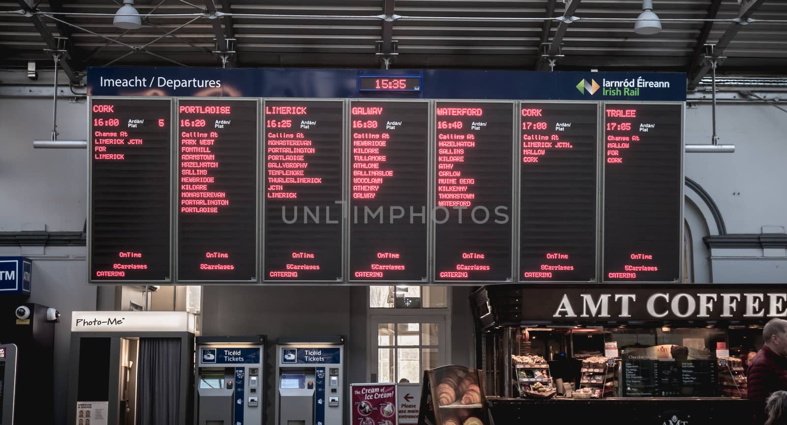 Dublin, Ireland - February 13, 2019: Billboards of train departures at Heuston train station on a winter day