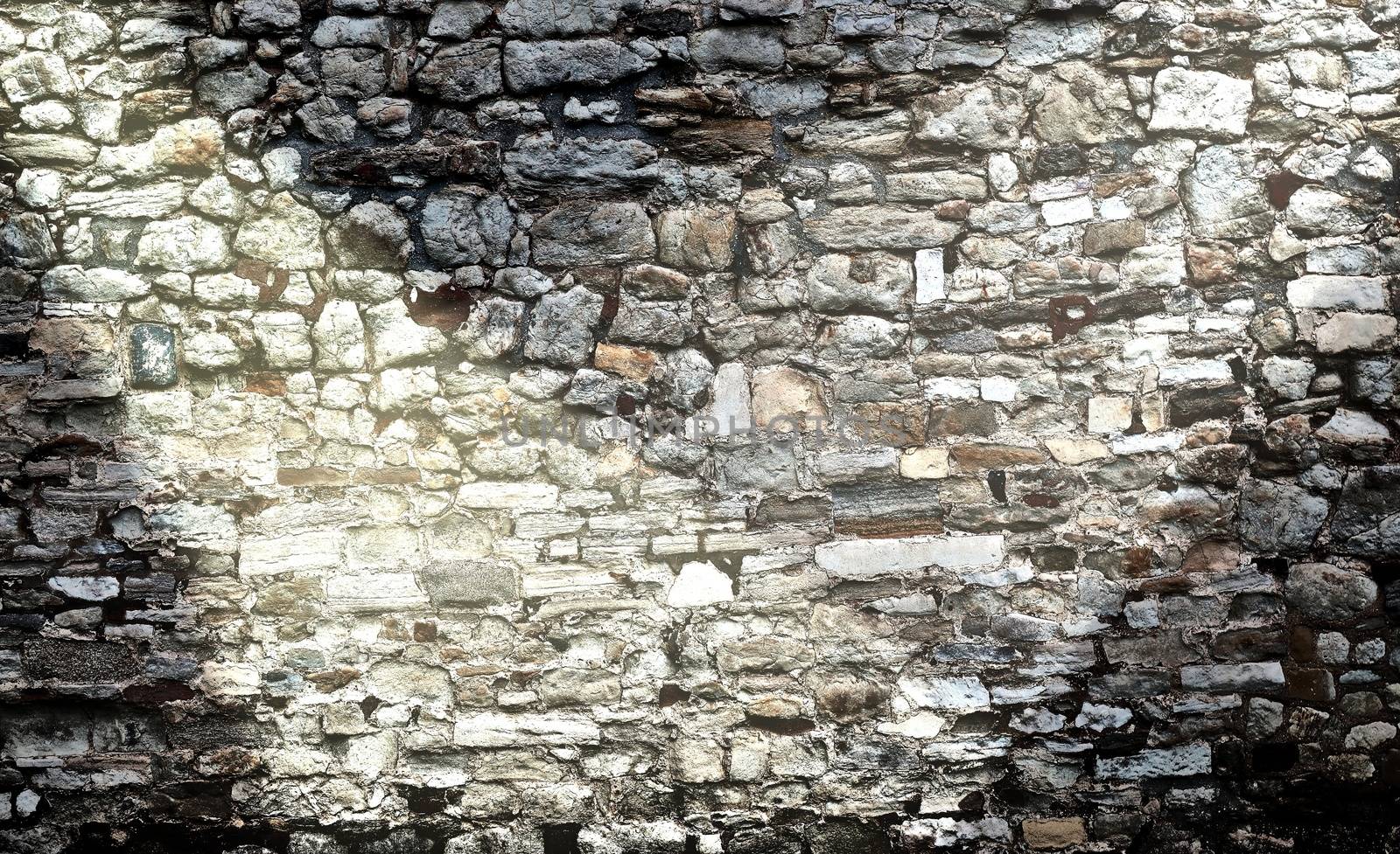 Aged and weathered brick wall textures with bright spotlight illumination