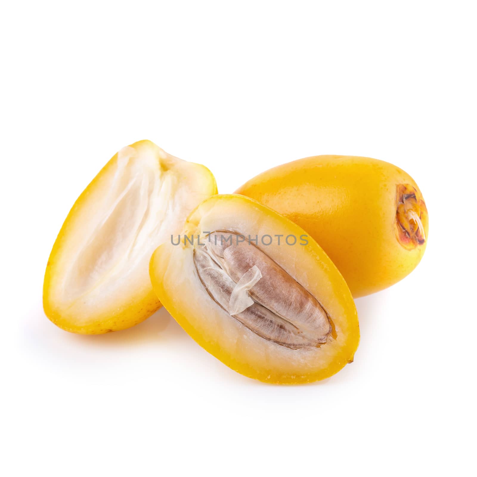 yellow raw date palm isolated over white background.