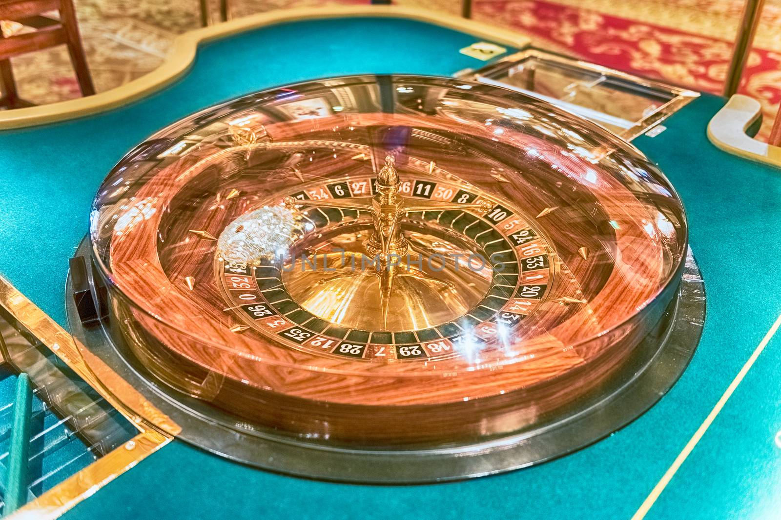 Classic roulette wheel with selective focus for bokeh effect. Concept for gambling and casino