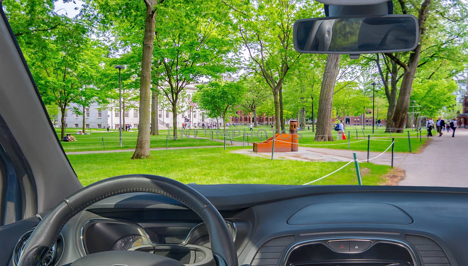 Looking through a car windshield with view of the Harvard University Campus, Cambridge, USA