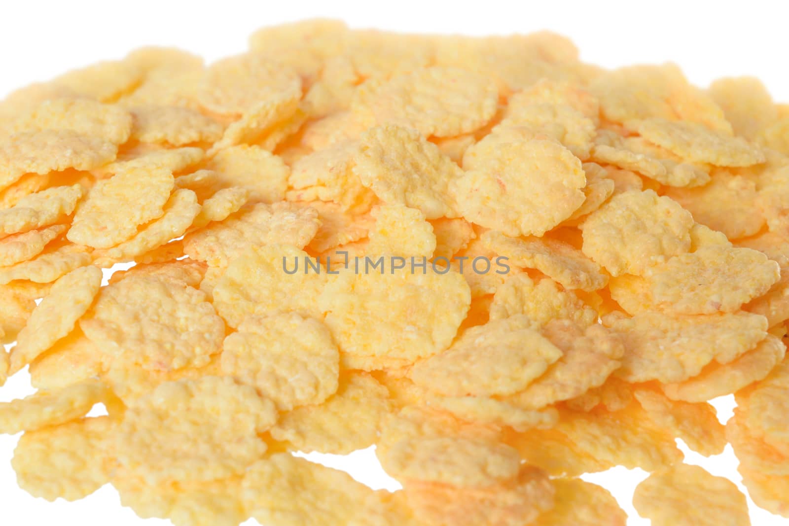 Cornflakes close up isolated on white background.