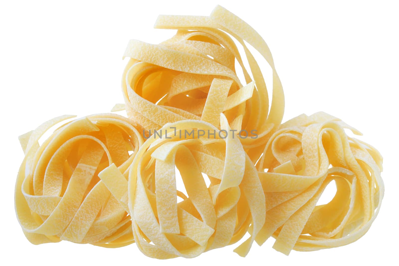 pasta pappardelle nest tower close up on a isolated white background.