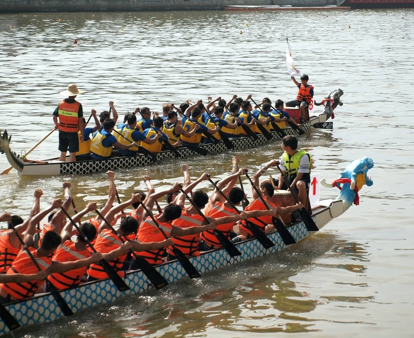 KAOHSIUNG, TAIWAN - JUNE 3: To celebrate the Duanwu Festival Kaohsiung City in Taiwan conducts Dragon Boat races on the Love River on June 3, 2011 in Kaohsiung, Taiwan.