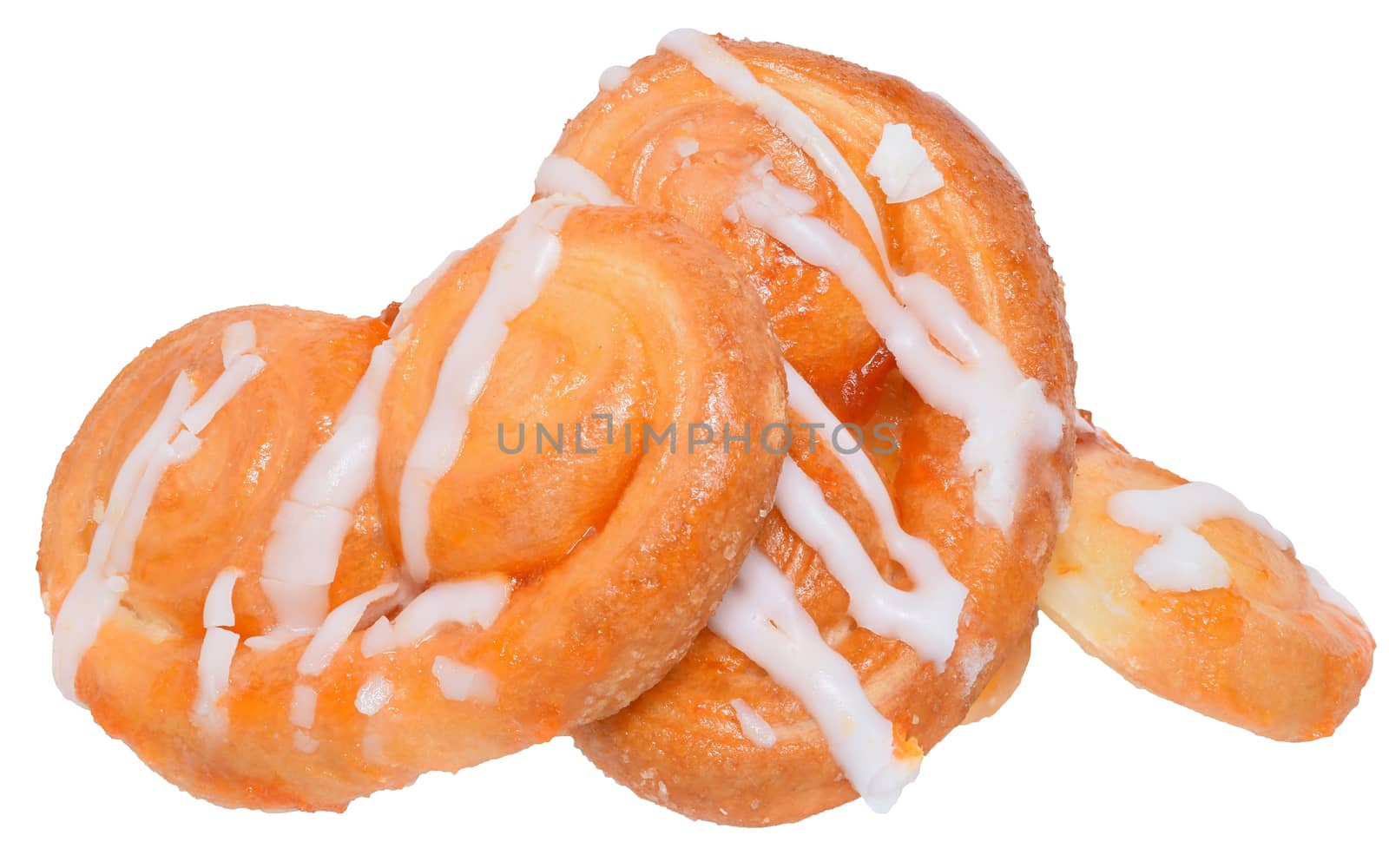 Pretzel shaped sugar cookies, made of puff pastry with butter on a white background. 