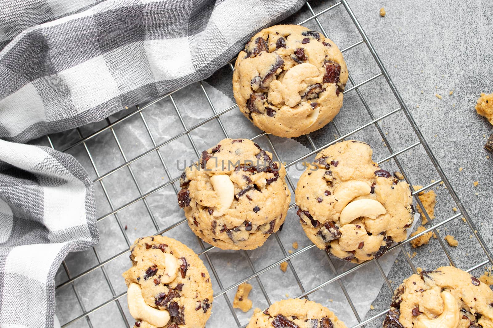 Stack of tasty chocolate cookies on gray table by freedomnaruk