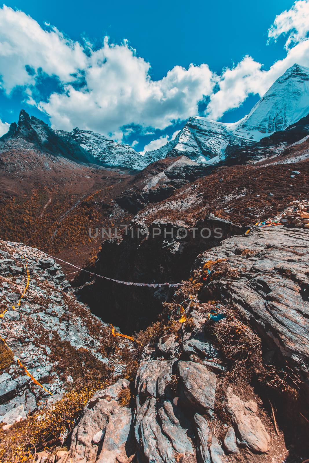 Pearl Lake or Zhuoma La Lake and snow mountain in autumn in Yading Nature reserve, Sichuan, China.