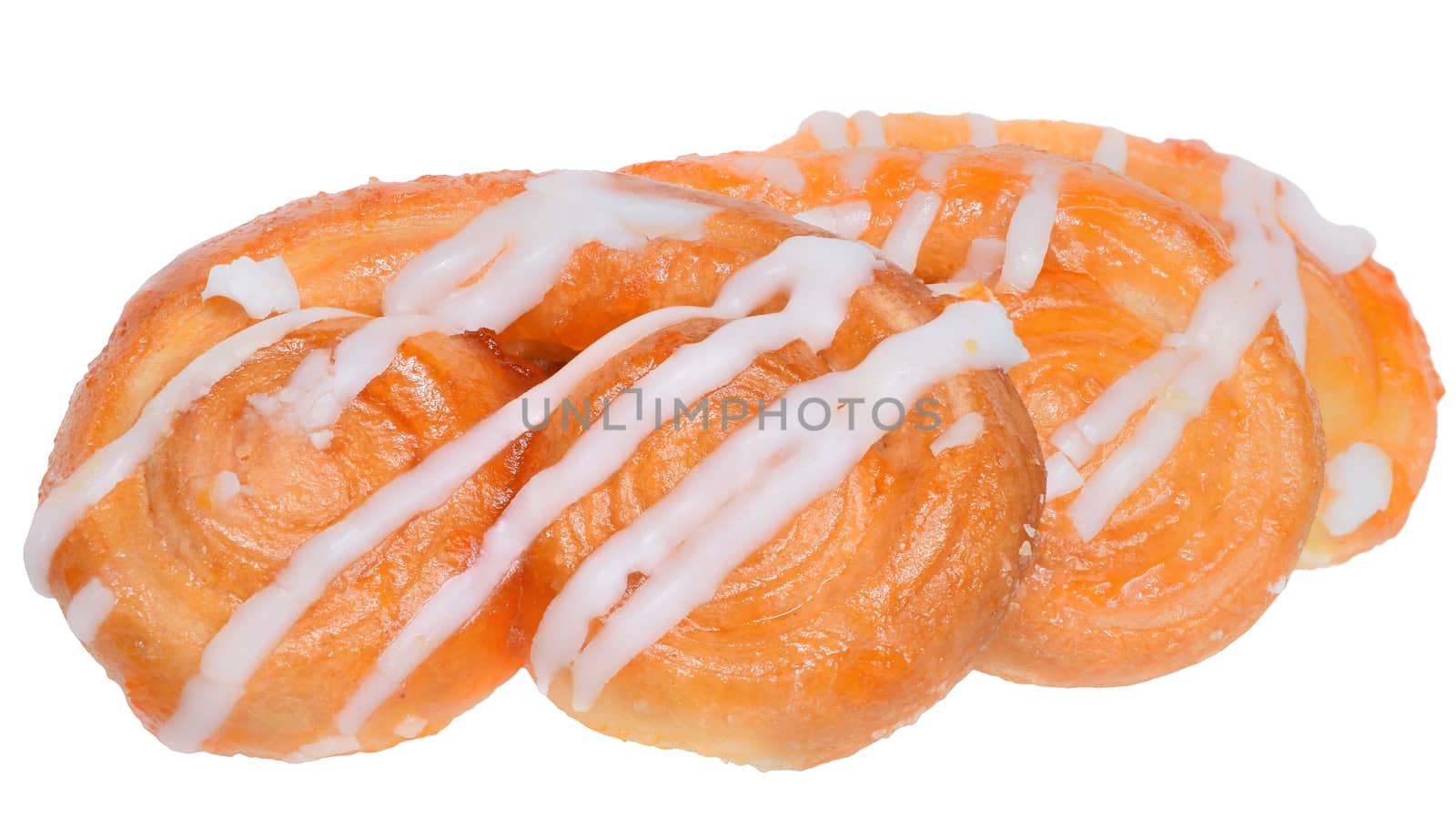 Pretzel shaped sugar cookies, made of puff pastry with butter on a white background. 