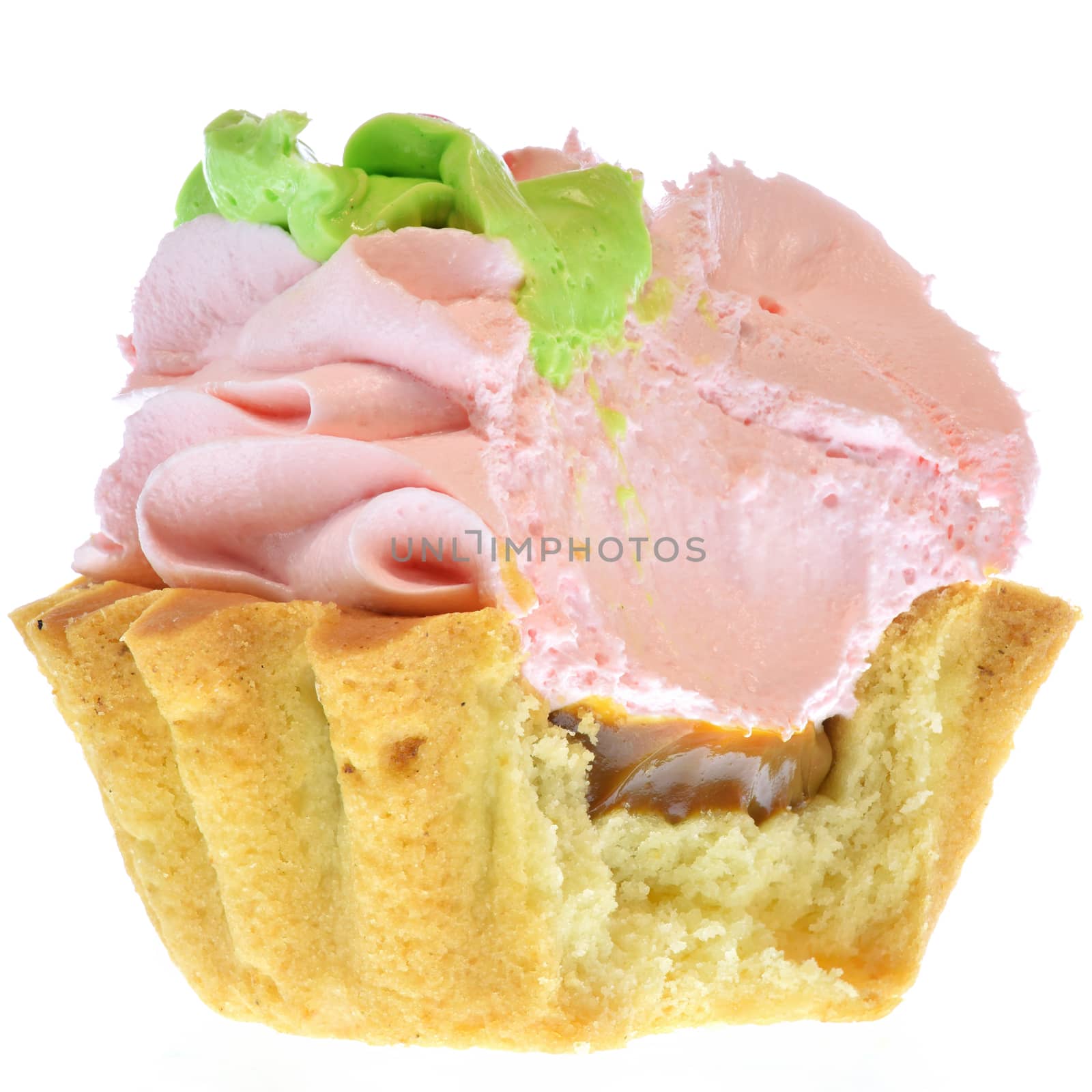 Bitten tartlet cake with strawberry cream filling isolated on a white background