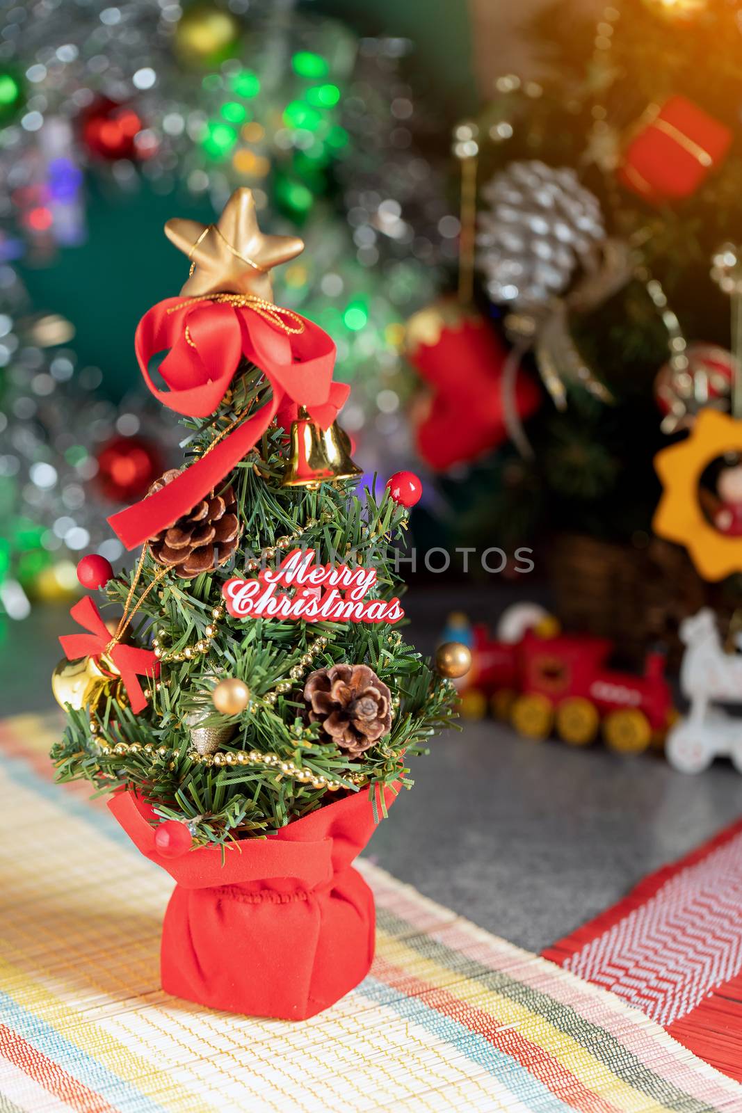 Christmas Background Of Defocused Lights With Decorated Tree