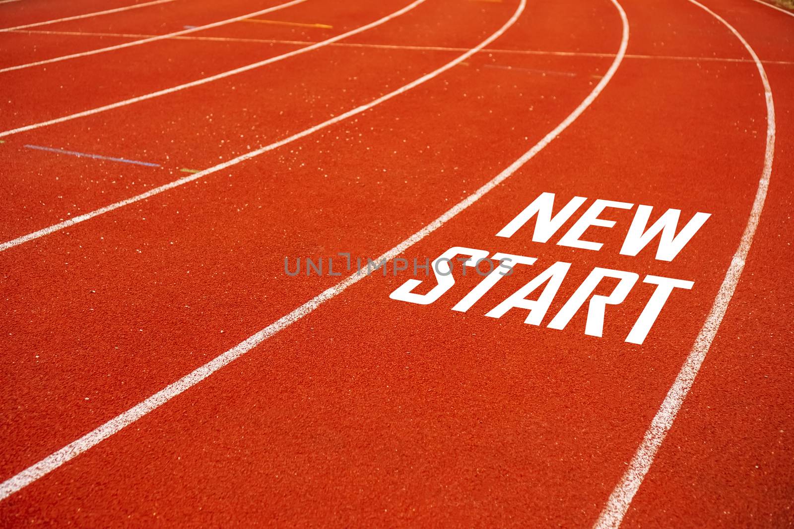 Start line on running court represents the beginning of a journey to the destination in business planning, strategy and challenge or career path, opportunity concept.