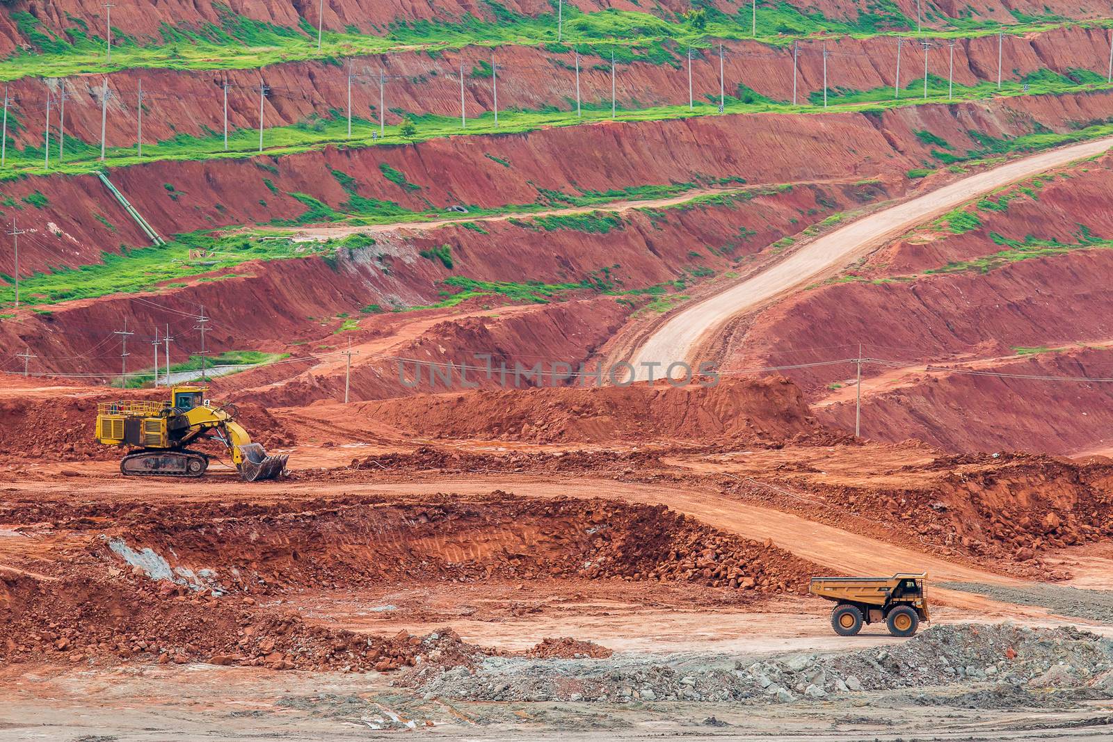 Part of a pit with big mining truck working by freedomnaruk