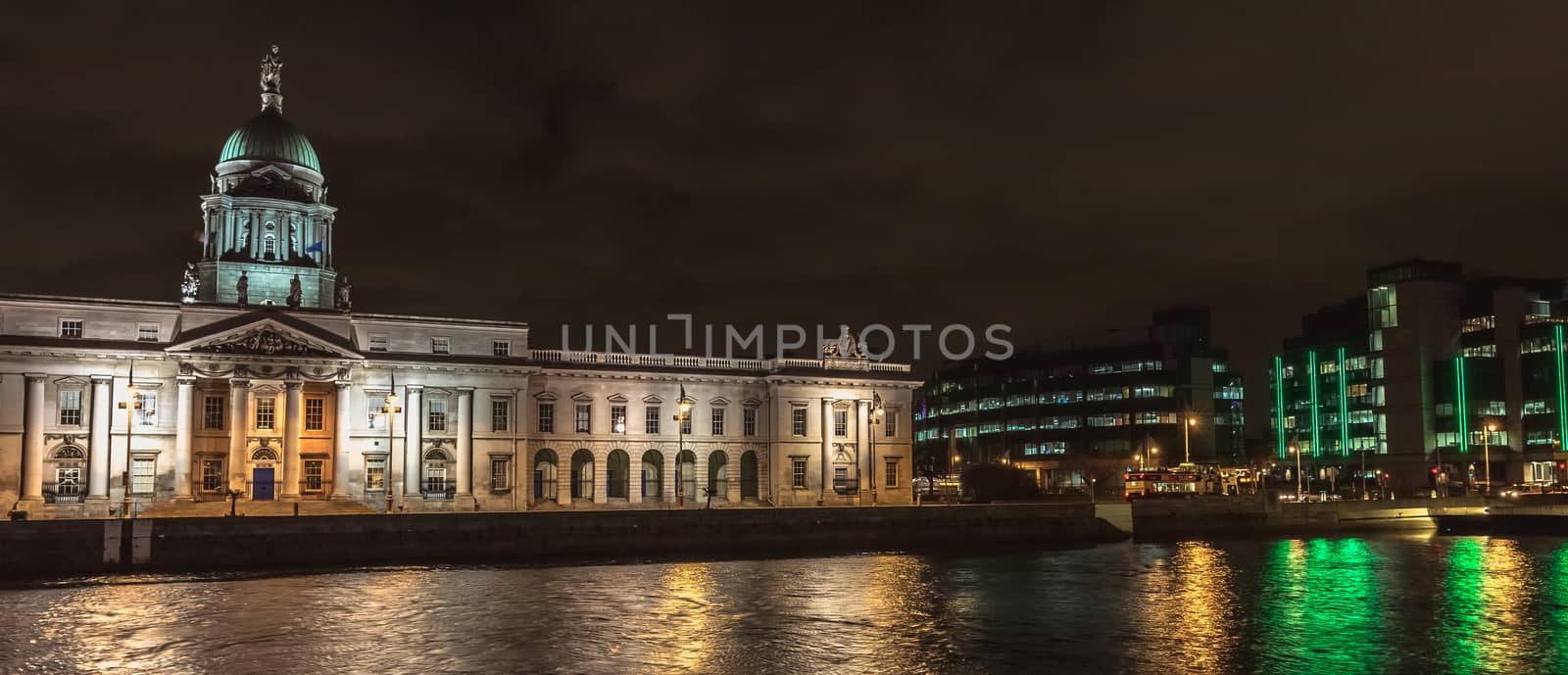 Dublin, Ireland - February 15, 2019: Architectural detail of the Custom House housing the Department of Housing, Planning and Local Government at night on a winter day