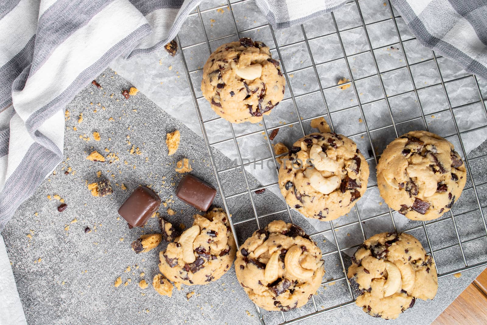 Stack of tasty chocolate cookies on gray table by freedomnaruk