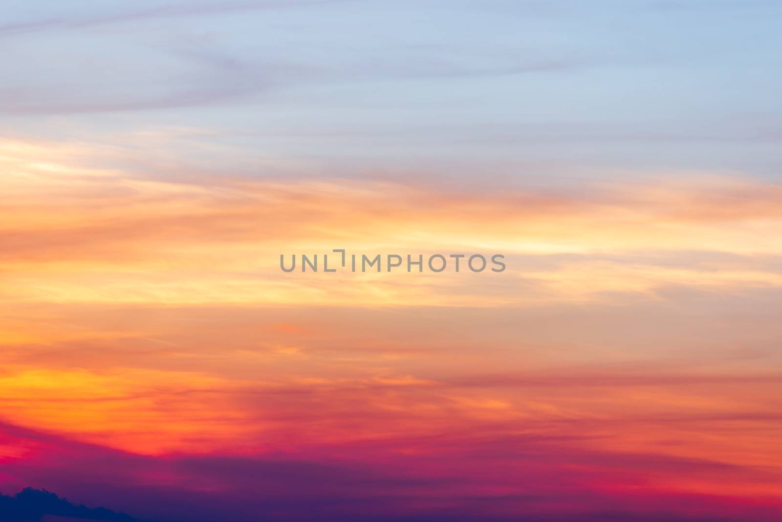 colorful dramatic sky with cloud at sunset