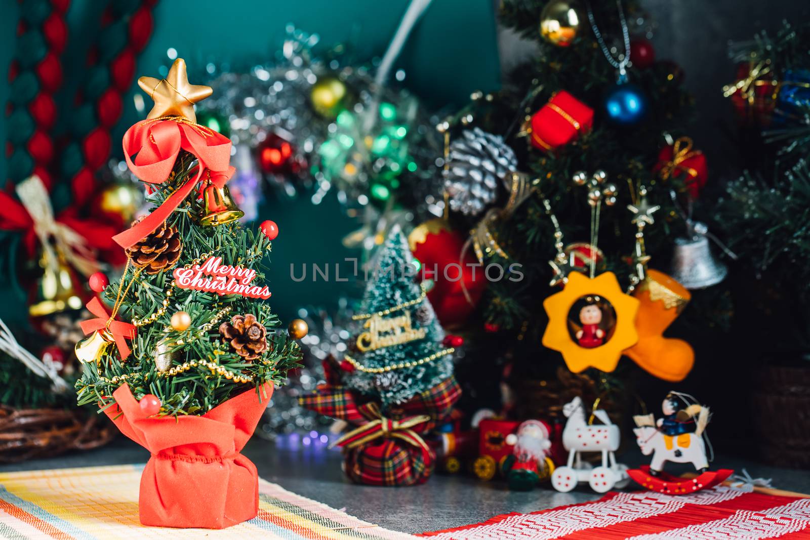 Christmas background with decorations and gift boxes on wooden