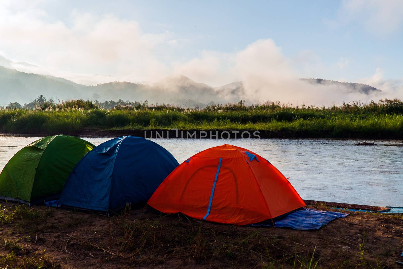 tourist tent camping in mountains by freedomnaruk