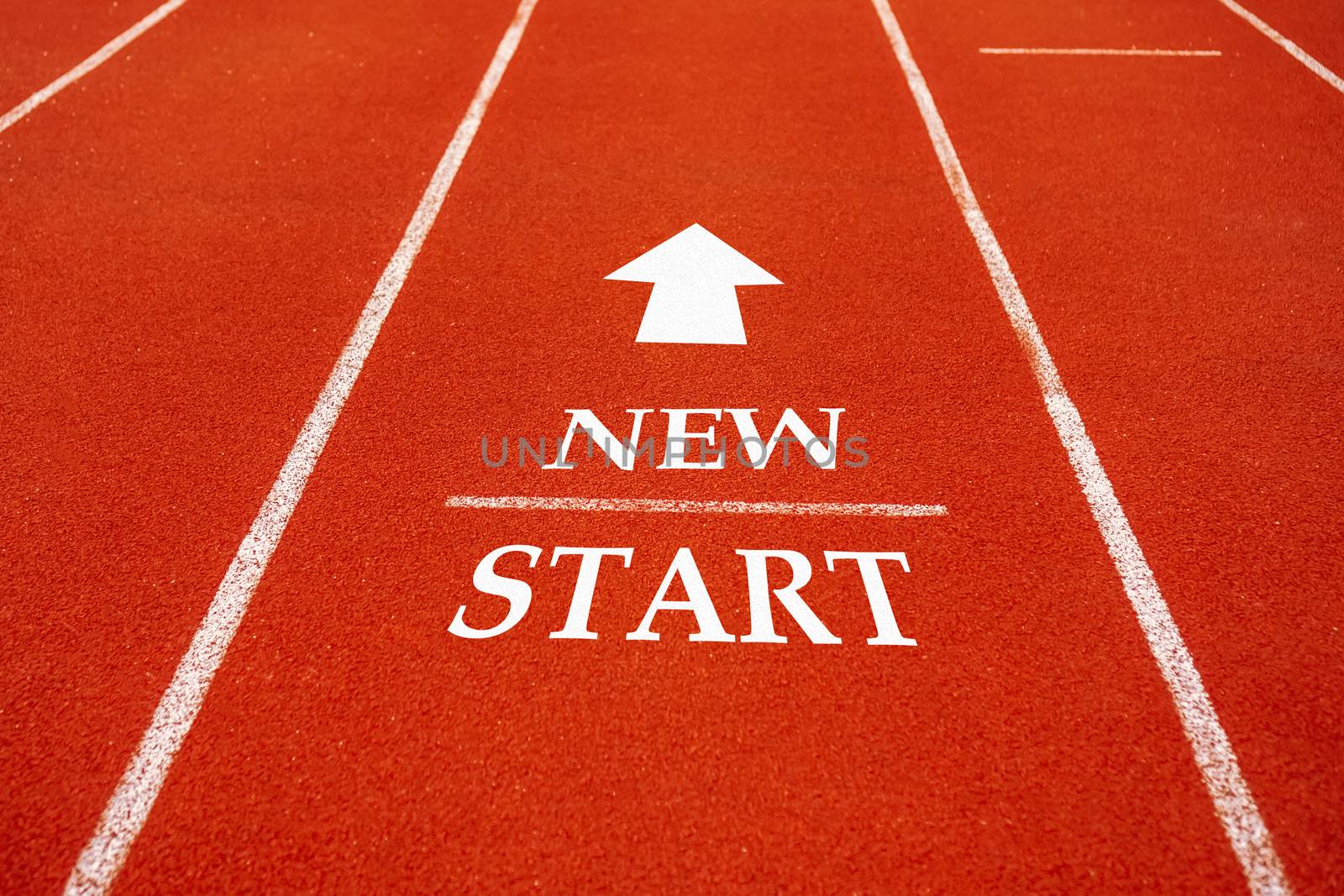 Start line on running court represents the beginning of a journey to the destination in business planning, strategy and challenge or career path, opportunity concept.