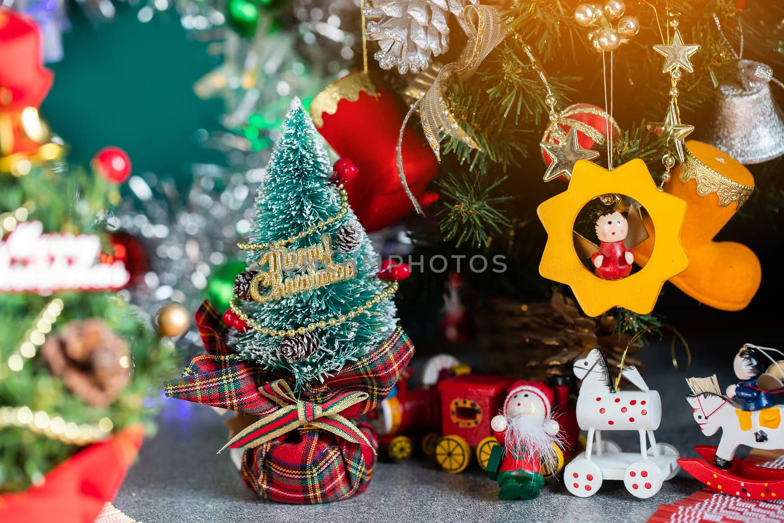 Christmas background with decorations and gift boxes on wooden