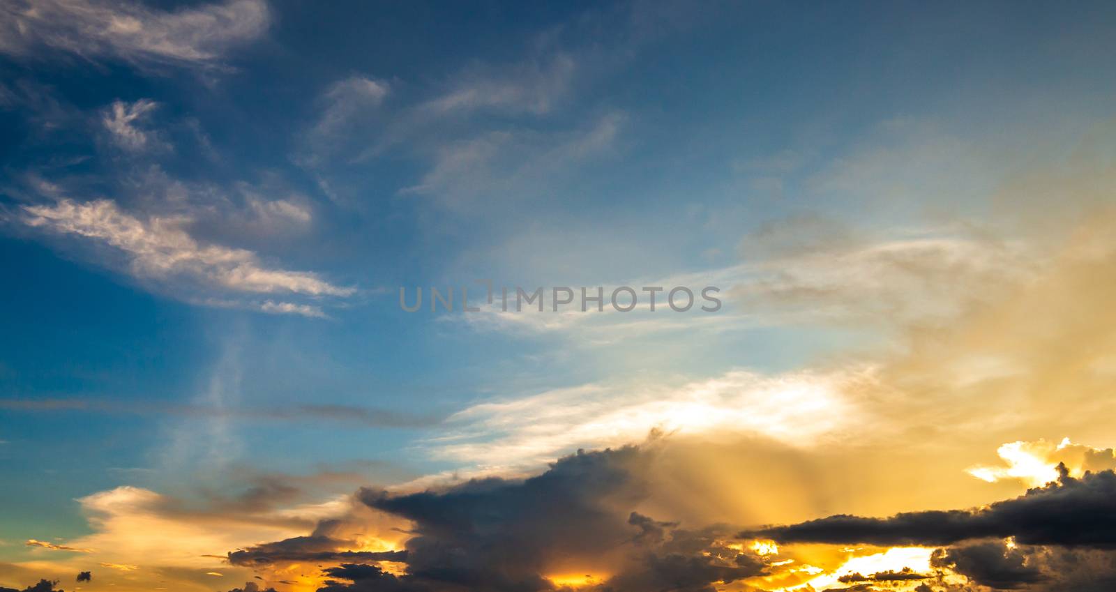 colorful dramatic sky with cloud at sunset