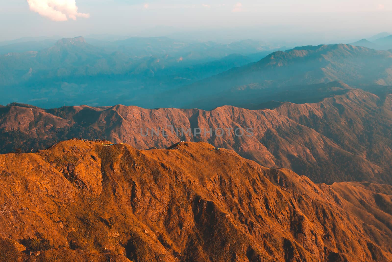 Top View Mulayit Taung golden light of the morning sun and the mist covered on Mount Mulayit,Myanmar