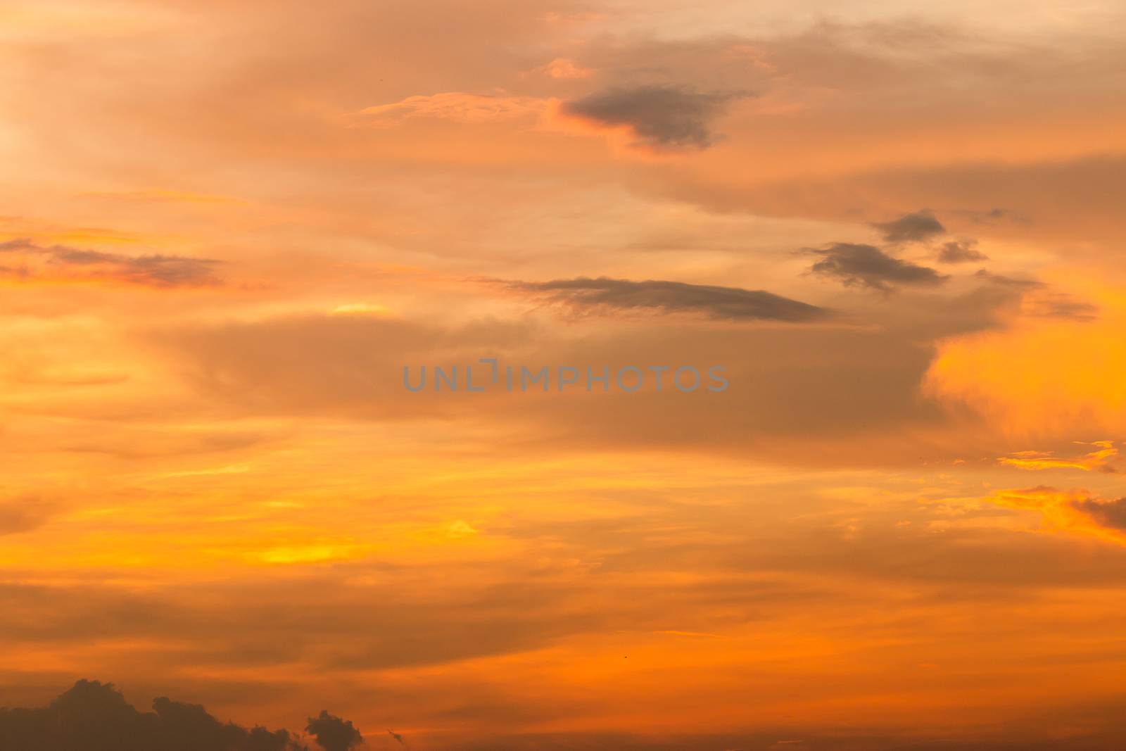 colorful dramatic sky with cloud at sunset