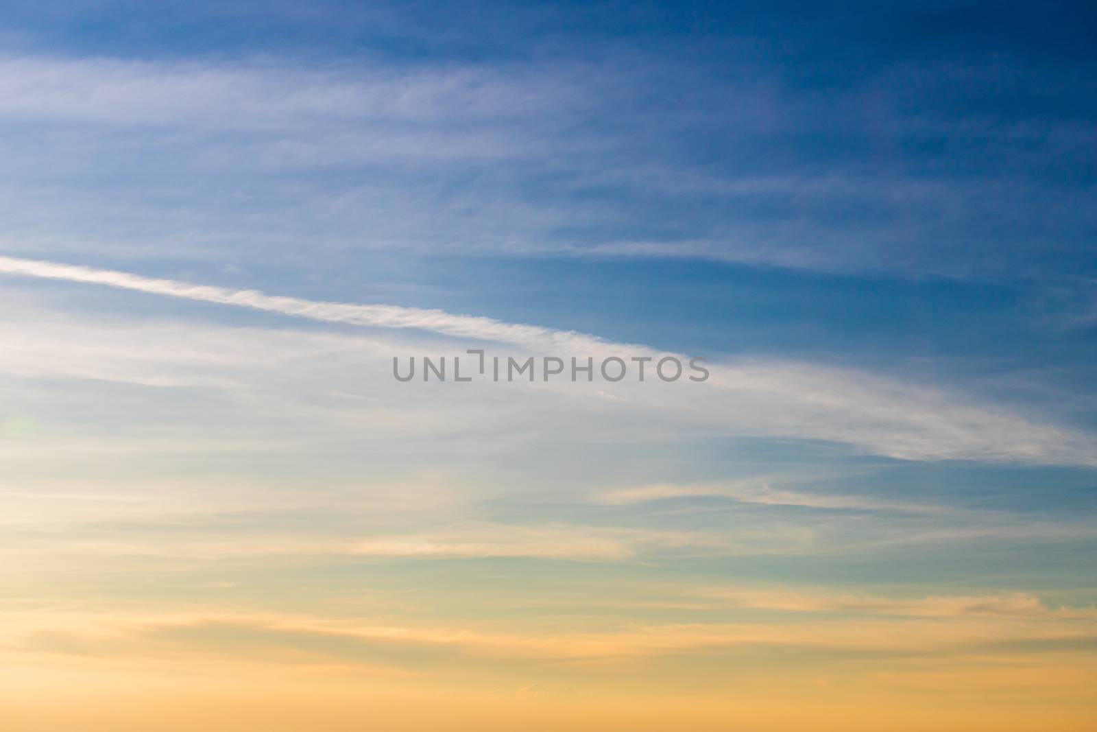 colorful dramatic sky with cloud at sunset