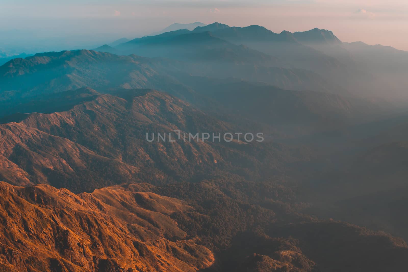 Mulayit Taung golden light of the morning sun and the mist covered on Mount Mulayit,Myanmar