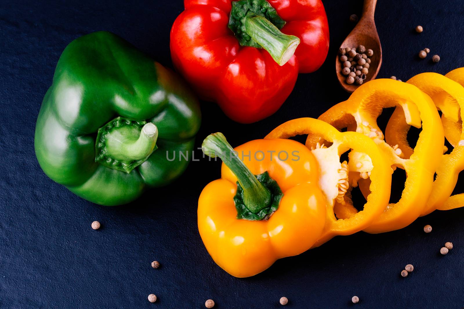 Three sweet peppers on a wooden background, Cooking vegetable sa by freedomnaruk