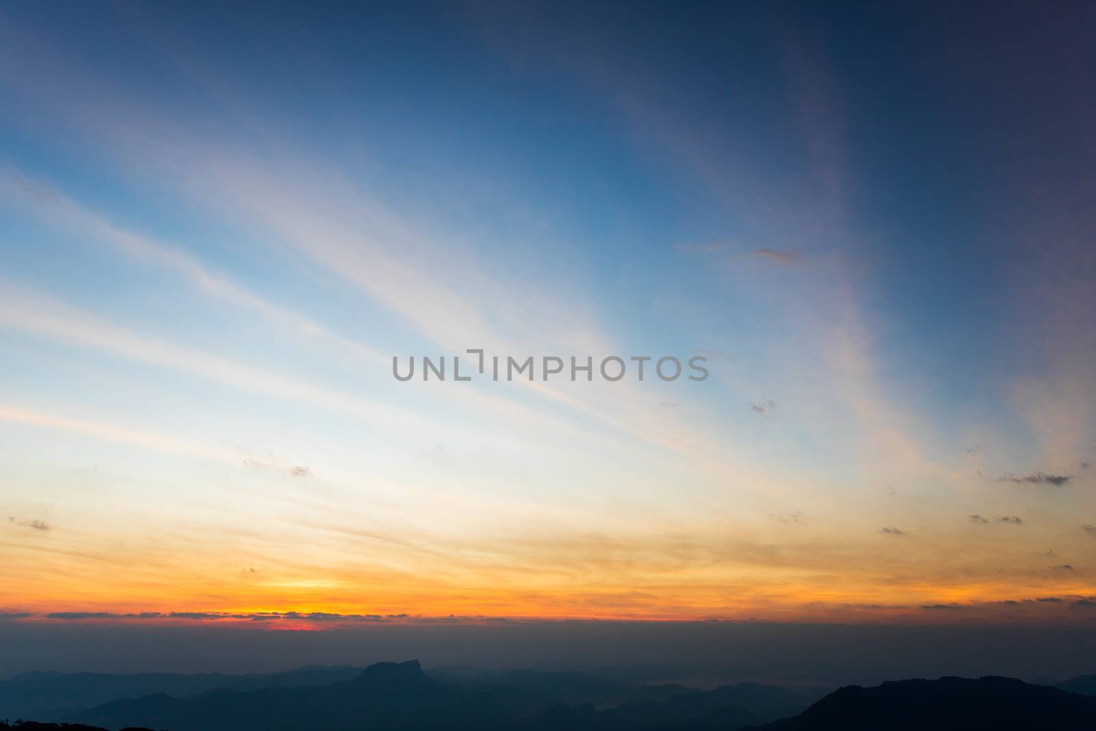 colorful dramatic sky with cloud at sunset