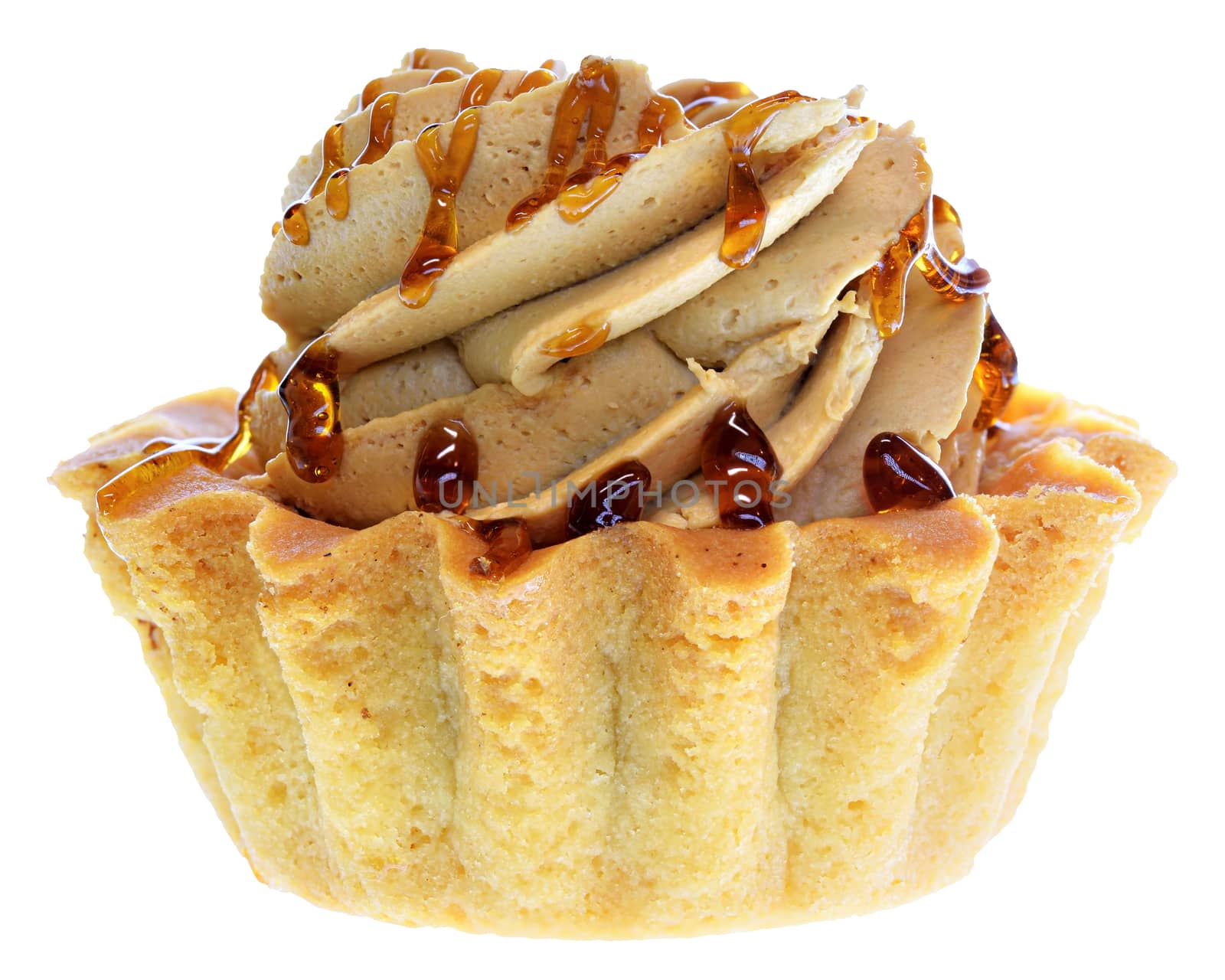 Tartlet cake with cream and caramel isolated on a white background.