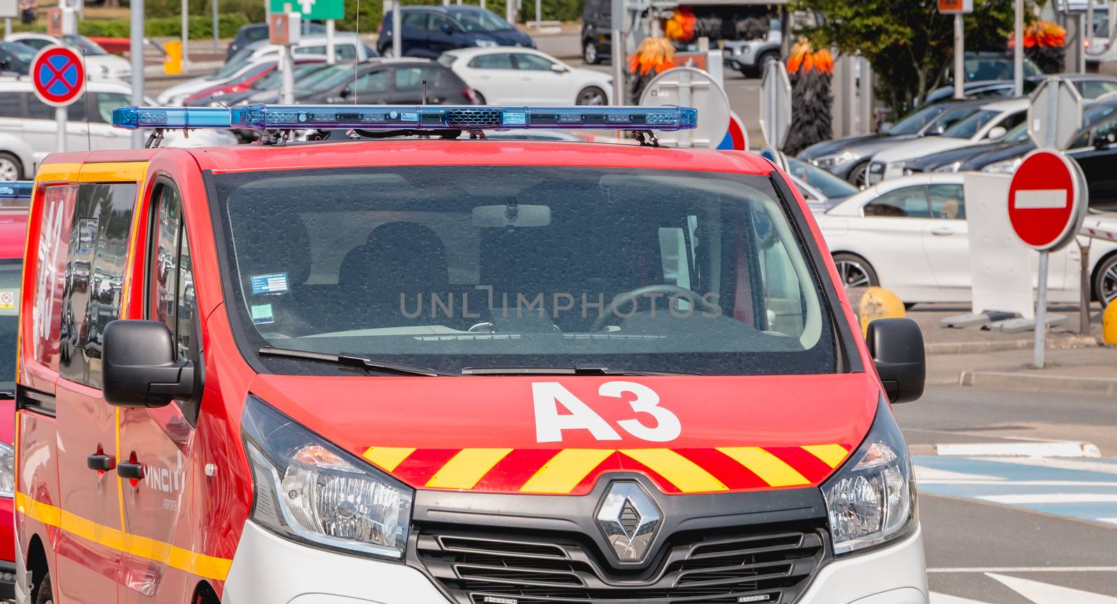 Nantes, France - August 7, 2018: fire truck on the car park of Nantes international airport on a summer day