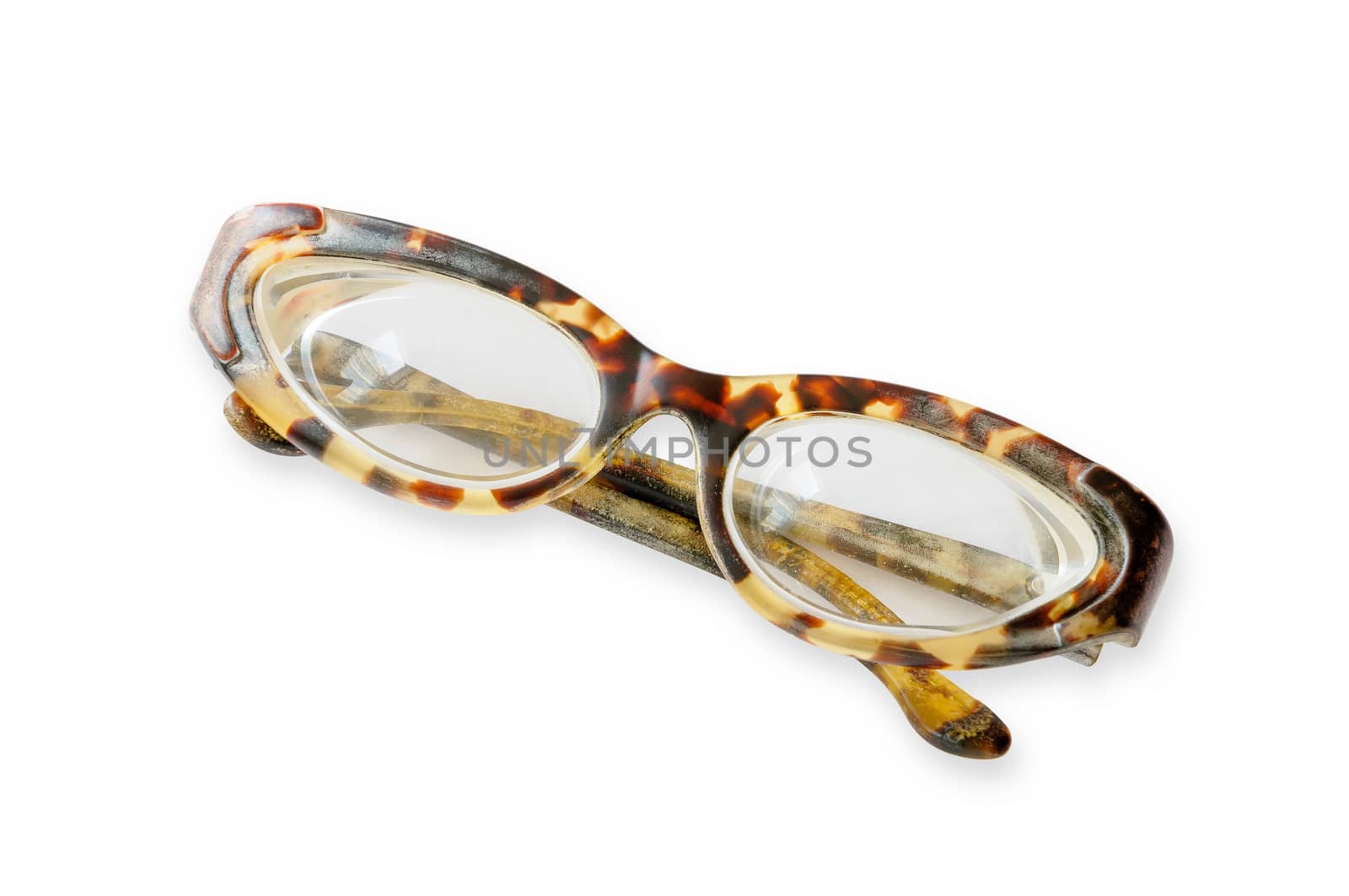Old tortoise spectacles on a white background