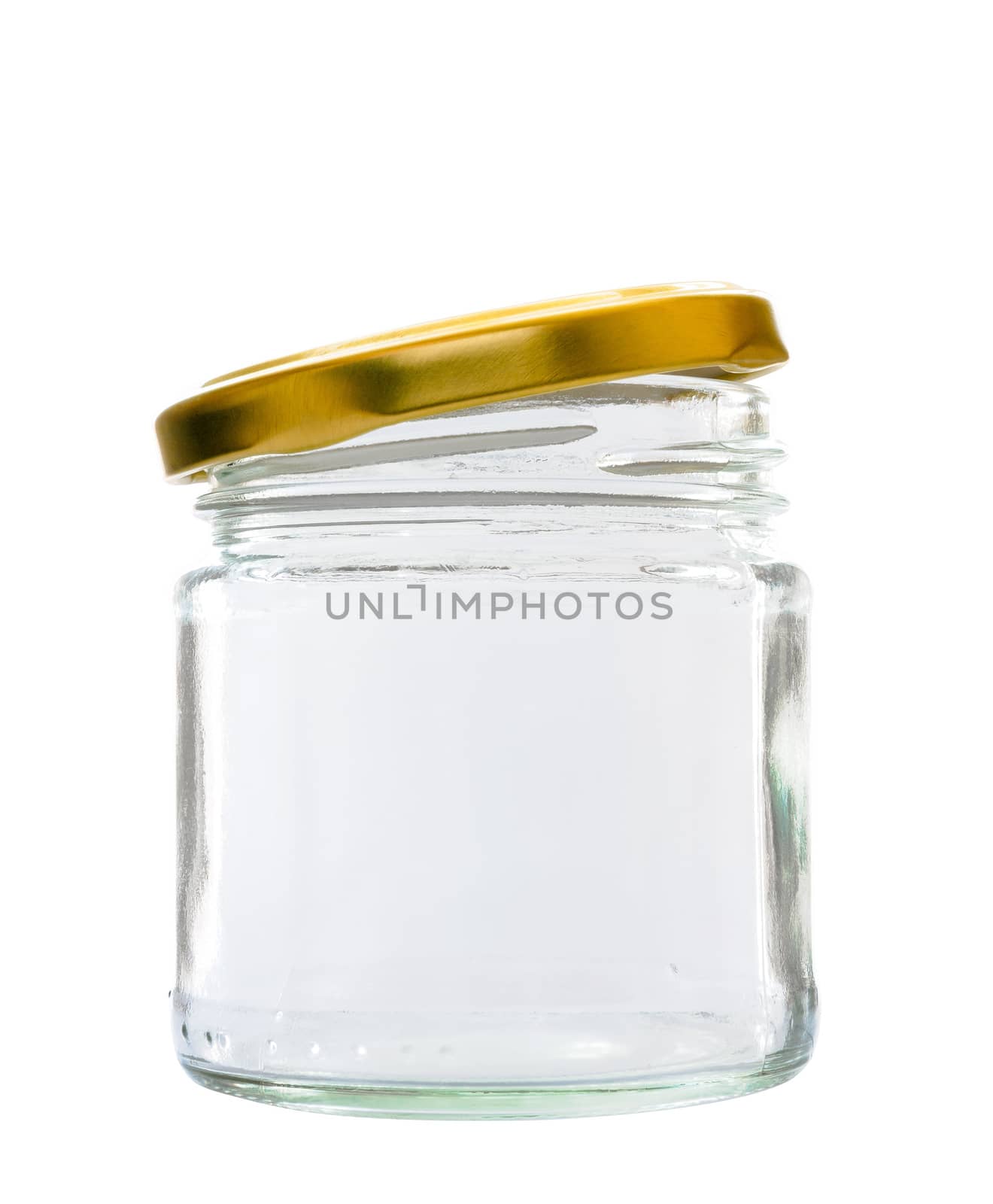 Transparent glass jar on white background, with the open gold color top