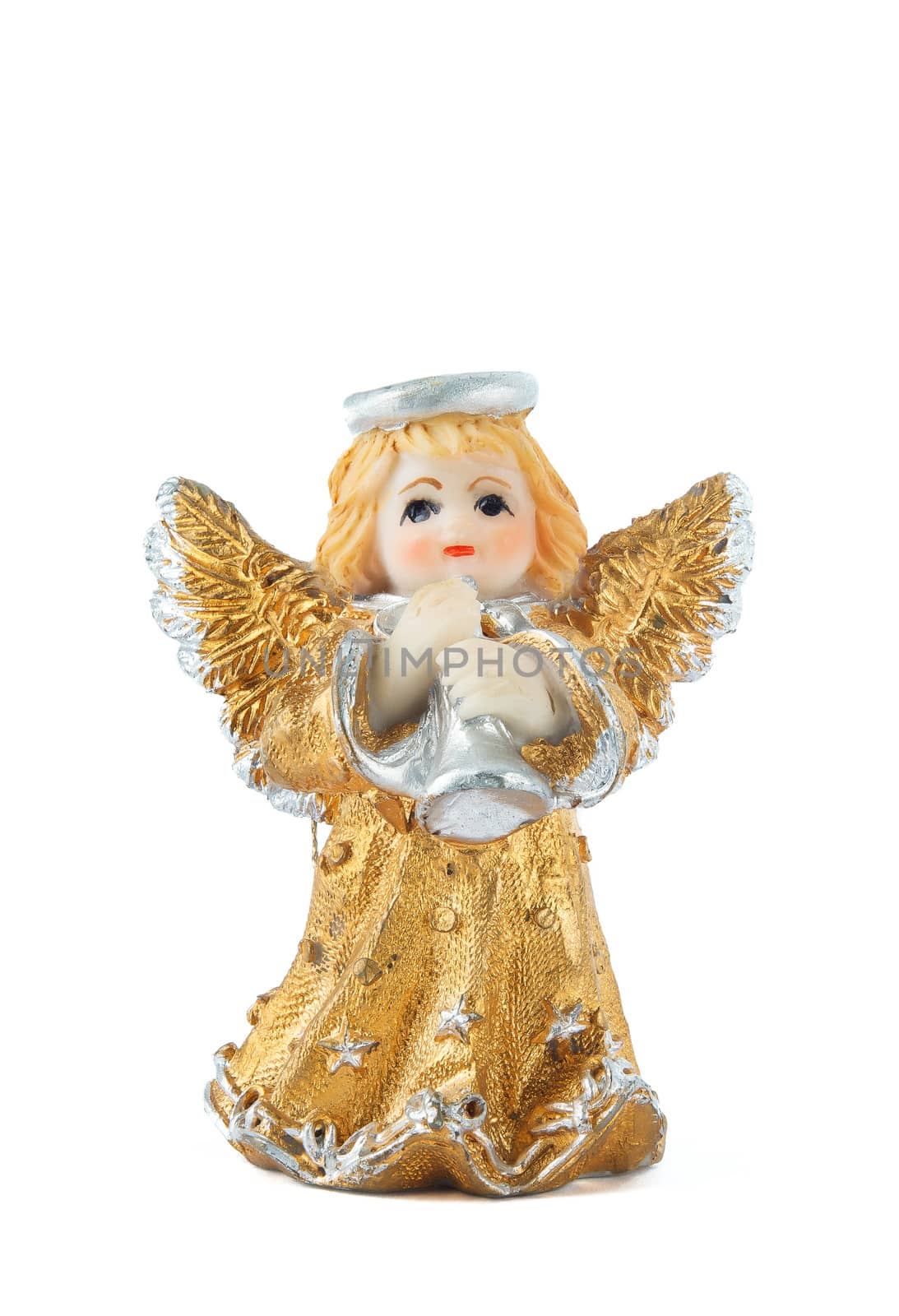 A little miniature statue of a colorful angel with wings and halo, playing the trumpet