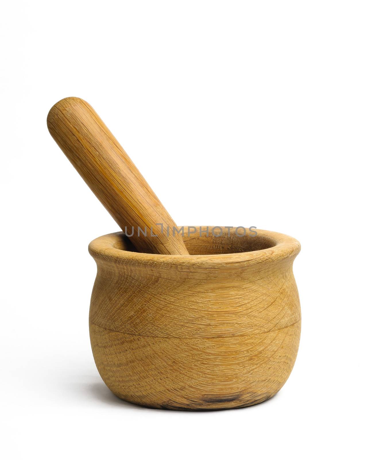 Olive wood mortar and pestle on white background