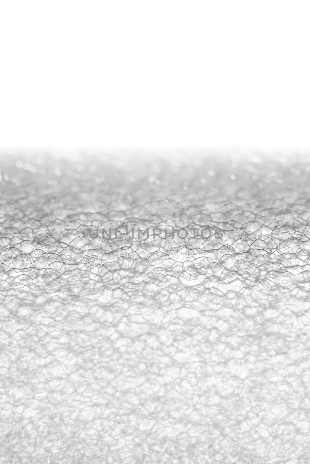 A white extruded polyethylene foam tube texture isolated on white background