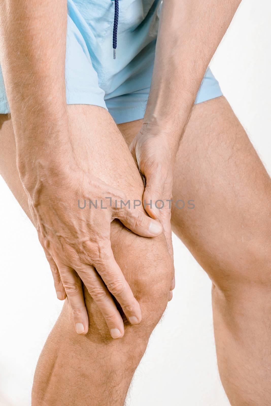 Athlete man feeling pain to the knee by MaxalTamor