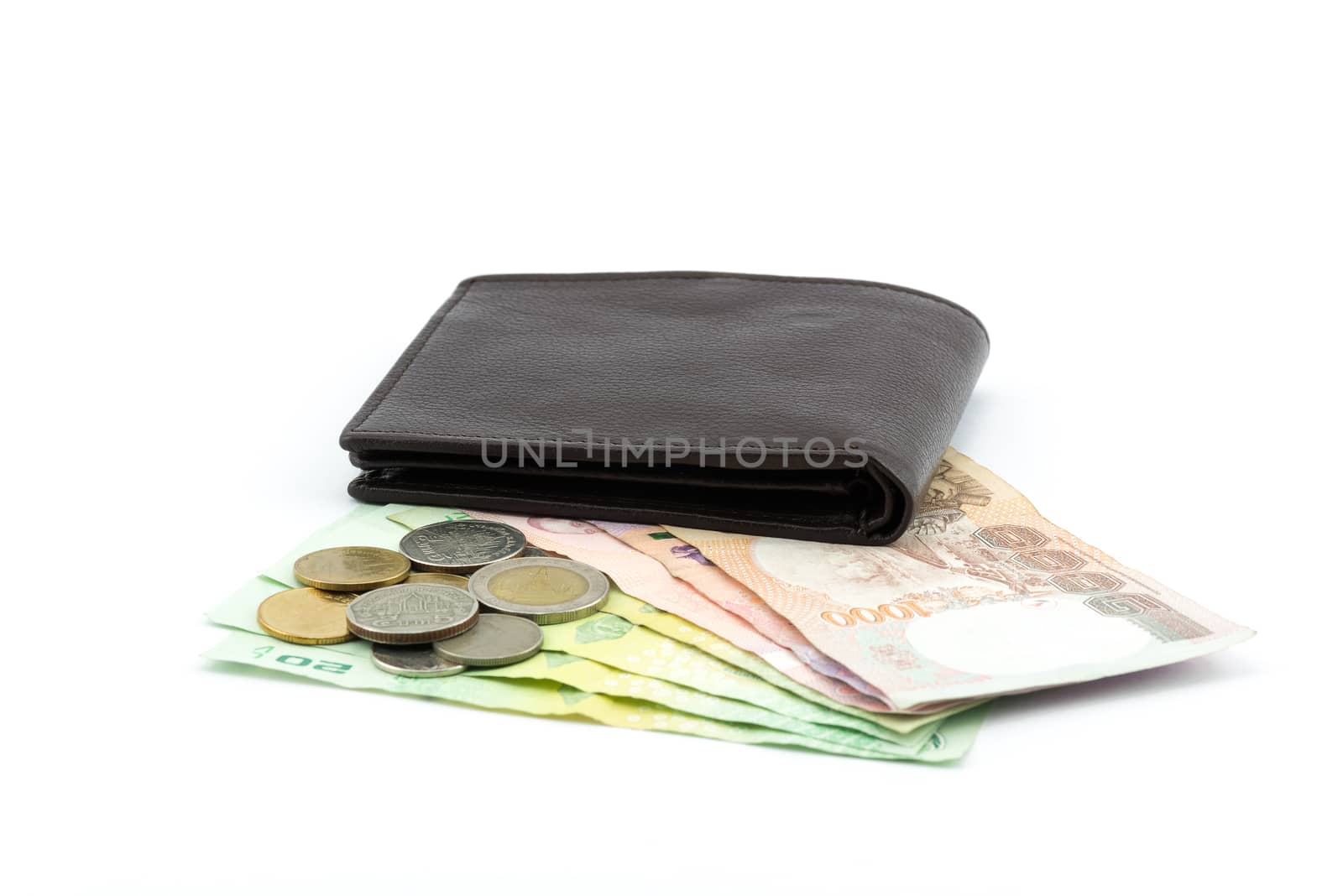 Wallet and money isolated on white background by YingTanthawarak
