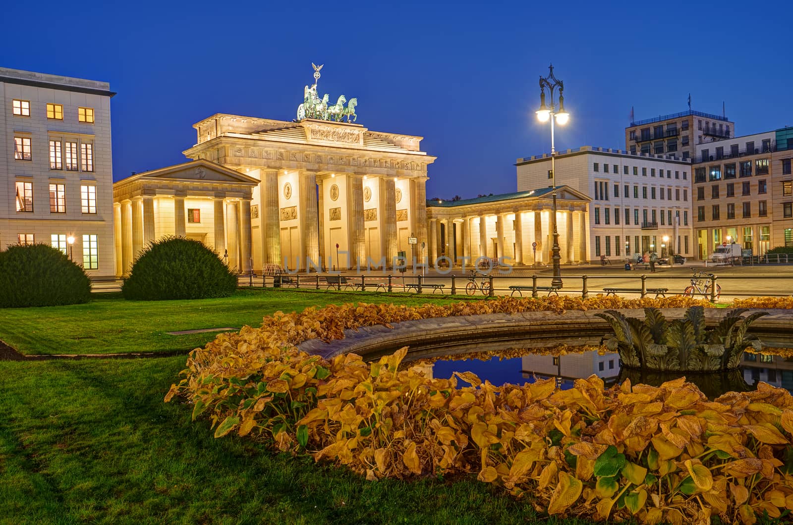Different view of the famous Brandenburg Gate in Berlin before sunrise