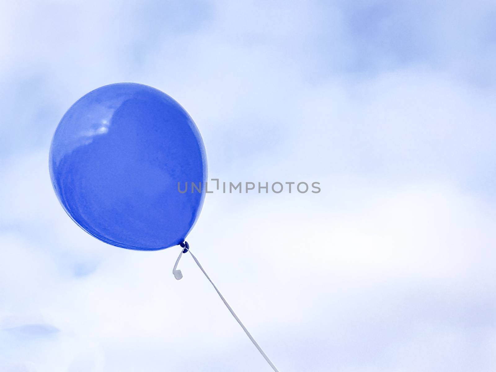 Blue balloon one in the sky, copy of space.