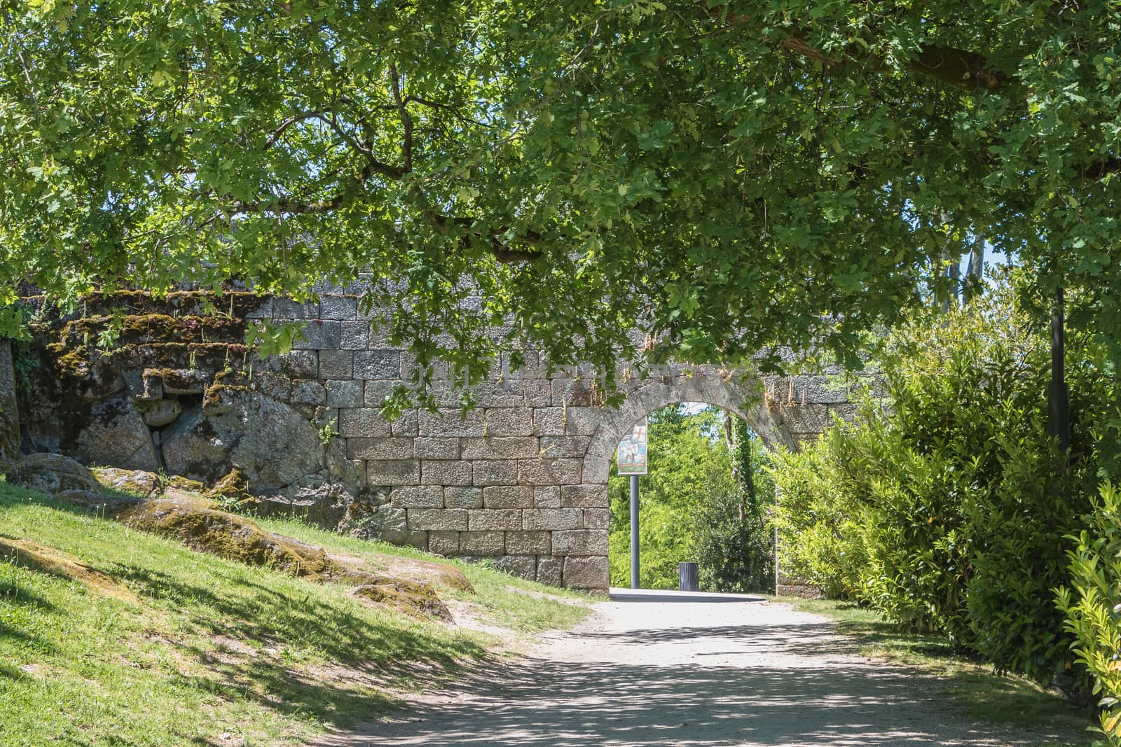 Architectural detail of the Guimaraes Castle that tourists visit by AtlanticEUROSTOXX